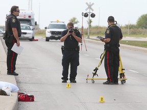 Winnipeg police investigate after a pedestrian was hit by a truck on Sterling Lyon Parkway on Thursday. (Brian Donogh/Winnipeg Sun)