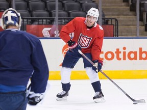 Team USA's Patrick Kane, of the Chicago Blackhawks, lines up a shot during a training session for the World Cup of Hockey in Toronto on Sept. 16, 2016. (THE CANADIAN PRESS/Chris Young)