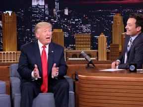 In this image released by NBC, Republican presidential candidate Donald Trump appears with host Jimmy Fallon during a taping of "The Tonight Show Starring Jimmy Fallon," Thursday, Sept. 15, 2016, in New York. (Andrew Lipovsky/NBC via AP)