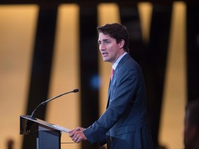 Prime Minister Justin Trudeau addresses the opening session at the Global Fund conference Friday, September 16, 2016 in Montreal. THE CANADIAN PRESS/Paul Chiasson
