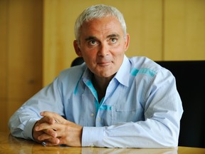 In this Sept. 9, 2008 file photo, multi-millionaire Frank Giustra talks about his teaming up with then-president Bill Clinton to sponsor a $100 million initiative to fund sustainable development in Latin America. (Ian Smith/Vancouver Sun/Postmedia Network)