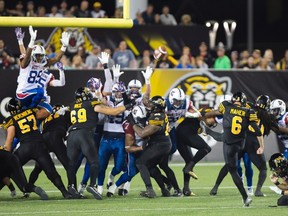 Hamilton Tiger-Cats kicker Brett Maher (6) kicks a game-ending field goal to give the Tiger Cats a 20-17 win over the Montreal Alouettes (The Canadian Press)