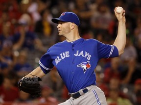 Toronto Blue Jays starting pitcher J.A. Happ throws to the Los Angeles Angels in Anaheim, Calif., on Sept. 15, 2016. (CHRIS CARLSON/AP)