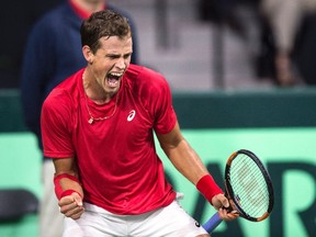Canada's Vasek Pospisil reacts after breaking Chile's Nicolas Jarry during Davis Cup tennis World Group playoff singles action in Halifax on Friday, September 16, 2016. (Darren Calabrese/The Canadian Press)