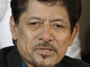 In this March 5, 2013 file photo, Moro National Liberation Front chairman Nur Misuari gestures during a press conference in suburban Taguig, south of Manila, Philippines. Abu Sayyaf extremists on Saturday, Sept. 17, 2016, freed a Norwegian man kidnapped a year ago in the southern Philippines along with two Canadians who were later beheaded and a Filipino woman who has been released by the ransom-seeking militants, officials said. Kjartan Sekkingstad was freed in Patikul town in Sulu province and was eventually secured by rebels from the larger Moro National Liberation Front, which has a signed a peace deal with the government and helped negotiate his release, officials said. Sekkingstad, held in jungle captivity since being kidnapped last September, was to stay overnight at the house of Misuari in Sulu and then meet with Philippine President Rodrigo Duterte on Sunday, said Jesus Dureza, who advises the president on peace talks with insurgent groups.