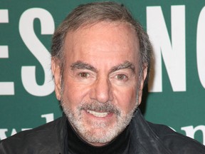 Neil Diamond signs copies of his album 'Melody Road' at Barnes & Noble in 2014.