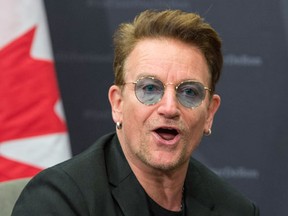 Bono makes a brief statement as he meets with Prime Minister Justin Trudeau at the Global Fund conference Saturday, September 17, 2016 in Montreal.