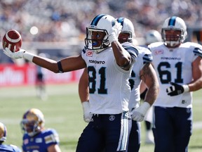 Toronto Argonauts' Tori Gurley (81) celebrates his touchdown against the Winnipeg Blue Bombers during the first half of CFL action in Winnipeg Saturday, September 17, 2016. THE CANADIAN PRESS/John Woods