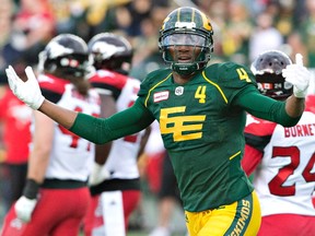 Edmonton Eskimos Adarius Bowman (4) celebrates a touchdown against the Calgary Stampeders during first half CFL action in Edmonton, Alta., on Saturday September 10, 2016.