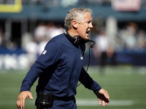 Seahawks head coach Pete Carroll calls to his team during a game against the Dolphins in Seattle on Sunday, Sept. 11, 2016. (Elaine Thompson/AP Photo)