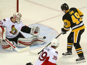 Senators goalie Chris Driedger kicks out one of the 43 shots he stopped on his way to a shutout against the Penguins in the 2016 Rookie tournament at Budweiser Gardens in London, Ont. on Saturday, Sept. 17, 2016. (Mike Hensen/Postmedia Network)