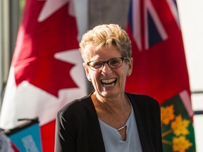 Ontario Premier Kathleen Wynne arrives for the announcement of Ontario150, a year-long celebration to mark the 150th anniversary of Ontario and Confederation, Friday September 16, 2016 in Ottawa. (Errol McGihon/Postmedia Network)