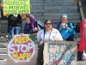 Manitobans who live near Highway 280 protest its condition outside the Manitoba Legislative Building in Winnipeg, Man., Tuesday, May 24, 2016. Some say the road has since improved but a long-term fix is proving a challenge. (Brian Donogh/Winnipeg Sun/Postmedia Network)