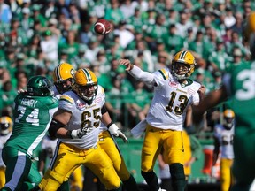 Edmonton Eskimos quarterback Mike Reilly (13) passes the ball during first half CFL action against the Saskatchewan Roughriders, in Regina on Sunday, September 18, 2016.