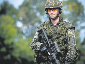 Royal Military College fourth-year Officer Cadet Luke Tamlin takes part in the Canadian Armed Forces Small Arms Concentration on Friday at the Connaught Ranges and Primary Training Centre in Ottawa.