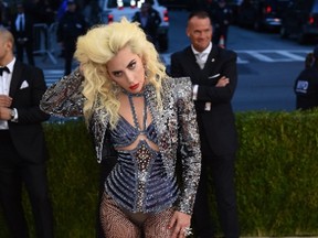 This file photo taken on May 1, 2016 shows Lady Gaga as she arrives at the Costume Institute Benefit at The Metropolitan Museum of Art in New York. Lady Gaga said September 15, 2016 that her new album will be named after her late aunt and explore her family heritage. The superstar, revealing details of her first contemporary pop album in three years, said it will be called "Joanne" and come out on October 21. Joanne was the name of a paternal aunt who died at age 19 after struggles with lupus. / AFP PHOTO / TIMOTHY A. CLARYTIMOTHY A. CLARY/AFP/Getty Images