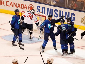 Leon Draisaitl (right) of Team Europe celebrates his goal with Tobias Rieder (8), Nino Niederreiter (22) and Roman Josi (59) in front of Team USA goalie Jonathan Quick at the World Cup of Hockey in Toronto on Saturday, Sept. 17, 2016. (Gregory Shamus/Getty Images)