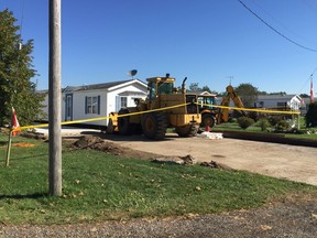 A man is fighting for his life after being crushed under a mobile home at Golden Pond RV Resort at 4340 Cromarty Rd., about 35 km east of London, Monday. (DEREK RUTTAN, The London Free Press)