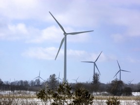 Wind-powered turbines spin on a wind farm in Port Burwell, a town near London, Ont. in this Feb. 8, 2016 file photo. (DEREK RUTTAN/THE LONDON FREE PRESS/Postmedia Network)