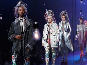 FILE - In this Sept. 15, 2016, file photo, the Marc Jacobs Spring 2017 collection is modeled during Fashion Week in New York. Jacobs was criticized for showcasing white models in dreadlocks during the show. A screengrab showed Jacobs later responding on Instagram that he doesn’t see color or race. In a separate post on Sunday, Sept. 18, 2016, Jacobs said he was sorry for “the lack of sensitivity” in responding to critics. (AP Photo/Mary Altaffer, File)