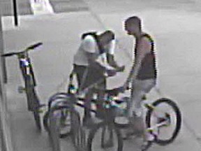 Kingston Police provided these surveillance photos of suspects in bicycle thefts outside of the Giant Tiger store.