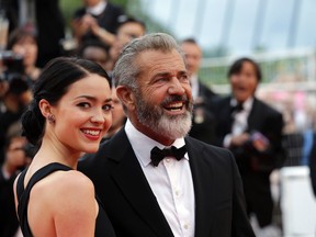 In this May 22, 2016, file photo, actor Mel Gibson, right and Rosalind Ross pose for photographers upon arrival at the awards ceremony at the 69th international film festival in Cannes, southern France. (AP Photo/Lionel Cironneau, File) ORG XMIT: NY124