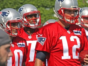 New England quarterbacks Tom Brady (12), Jimmy Garoppolo (10) and Jacoby Brissett (7).