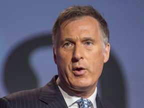 Conservative MP Maxime Bernier speaks at the 2016 Canadian Telecom Summit in Toronto June 7, 2016. (THE CANADIAN PRESS/Eduardo Lima)