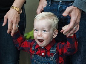 Isaac Tymchuk, 2, is pictured with his parents at the Mazankowski Alberta Heart Institute in Edmonton, Alta., on Monday, Sept. 19, 2016. The young toddler from Calgary became the first neonatal cardiac hybrid surgery patient in Western Canada almost two years ago. (Codie McLachlan/Postmedia)