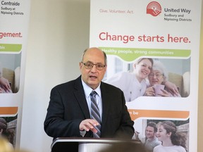 John Rimore, execuative director of the John Howard Society of Sudbury, talks about the Caring Dads program at a media conference in Sudbury on Monday. Gino Donato/Sudbury Star