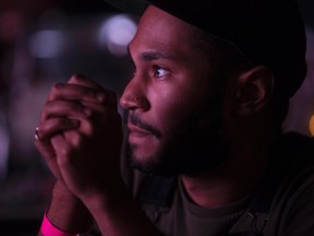 Kaytranada watches a performance at the 2016 Polaris Music Prize in Toronto on Monday, September 19, 2016. THE CANADIAN PRESS/Chris Young
