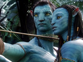 FILE - This image released by 20th Century Fox shows the characters Neytiri, right, and Jake in a scene from the 2009 movie "Avatar." Fans of the film “Avatar” can now experience Pandora in person. The “Avatar: Discover Pandora” exhibition will open in Taiwan in December before traveling the world next year. Fox Consumer Products said Monday, Sept. 19, 2016, the exhibit will feature flora and fauna from the fictional planet as well as interactive experiences with its indigenous population, the Na’vi.