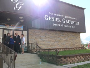 After years of ownership Huguette Génier (middle left) is passing over the keys to Carine Deschênes (left) and her husband Jamie Rheault owners of Irvine and Irivine Funeral Home. Julie Leonard will remain as Managing Funeral Director at Génier Gauthier.