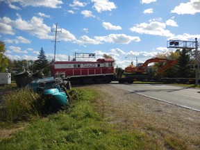 A train derailed near Hadashville, Man., after colliding with a gravel truck, on Monday.