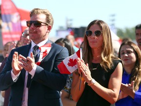 Former Ottawa Senators captain Daniel Alfredsson becomes a Canadian citizen with his wife Birgitta Backman Alfredsson at the World Cup of Hockey Fan Zone in Toronto on Sept. 20, 2016. (Dave Abel/Toronto Sun/Postmedia Network  )