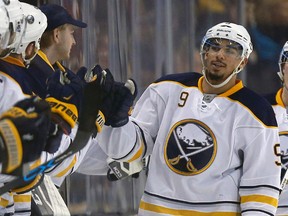 In this Dec. 26, 2015, file photo, Buffalo Sabres forward Evander Kane celebrates his goal during the second period of an NHL hockey game against the Boston Bruins in Boston. (AP Photo/Michael Dwyer, File)