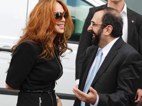 U.S. anti-Islam activists Pamela Geller, left, and Robert Spencer chat ahead of an anti-Islam demonstration in Stockholm, on August 4, 2012, where they were expected to make speeches. (FREDRIK PERSSON/AFP/GettyImages)