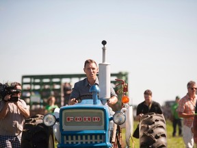 Ontario PC Leader Patrick Brown takes part in a plowing competition during the International Plowing Match in Harriston, Ont. on Tuesday, September 20, 2016. (THE CANADIAN PRESS/Hannah Yoon)
