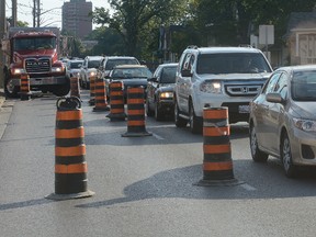 Traffic is bumper to bumper Tuesday on Oxford Street near Wharncliffe Road where utility work reduced the roads to one lane each. (MORRIS LAMONT, The London Free Press)