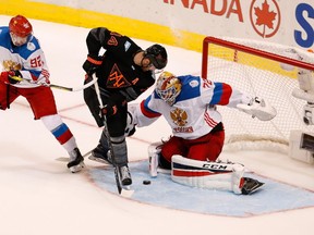 Sergei Bobrovsky of Team Russia makes a save on Morgan Rielly of Team North America in the second period during the World Cup of Hockey. (Gregory Shamus/Getty Images)