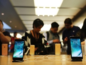 The new iPhone 7 and the 7 Plus are displayed on a table at an Apple store in Manhattan on Sept. 16, 2016 in New York City. (Photo by Spencer Platt/Getty Images)