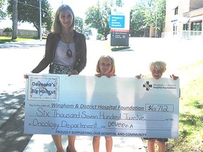 WDH Foundation Coordinator recently accepted a $6,712 donation from six-year-old Deveena Devries and her brother Darcy. The money was raised during the big barbecue fundraiser at the Wingham Fire Hall this summer. (Submitted)