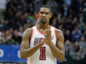 In this Feb. 3, 2016, file photo, Miami Heat forward Chris Bosh reacts to a call during the second half of an NBA basketball game against the Dallas Mavericks, in Dallas. (AP Photo/LM Otero, File)