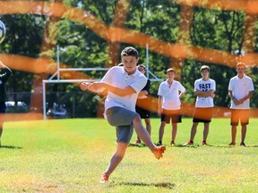 Tim Miller/The Intelligencer
Grade 9 Nicholson Catholic College student, Jackson Fox, takes part in a soccer skills competition at the school's Peace Day event on Wednesday in Belleville.