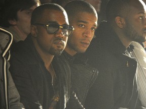Recording Artist Kanye West and Kid Cudi attend the Band of Outsiders Fall 2011 fashion show during Mercedes-Benz Fashion Week at SIR Stage on February 12, 2011 in New York City. (Jason Kempin/Getty Images)