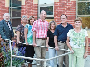 Recipients of the Moore Community Foundation's $1,000 grant. From left to right: Moore Museum's James Townsend, Brigden Community Decoration Team's Darlene Pepper and Elsbeth McCormick, Corunna Horticultural and Improvement Association's Gord Dawson, Barbara Warwick and Brad Cote, and Chair of the Moore Foundation Jane Marsh. (Carl Hnatyshyn/Postmedia Network)
