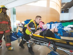 Paramedic students at Centennial College test their skills in a mock disaster simulation. The program is offered as a joint degree program with the University of Toronto Scarborough, allowing students to earn both a university degree and a college diploma. The two institutions have also teamed up to offer journalism and new media studies programs.