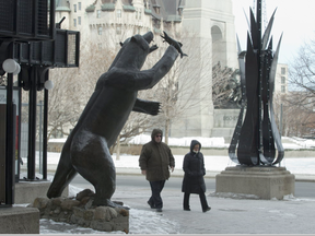 The bear statue on Sparks Street, created by the late Bruce Garner, will be moving along to make way for a Stanley Cup memorial. (Pat McGrath, Postmedia)