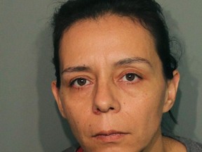 This booking photo released Wednesday, Sept. 21, 2016, by the Calaveras County Sheriff's Office shows Guadalupe Sierra Arrellano in San Andreas, Calif. Arrellano is one of two women arrested on charges of holding multiple men captive at an illegal marijuana plantation in Northern California and forcing them to work there for several months. Calaveras County Sheriff's Capt. Jim Macedo said Wednesday the men fled the secluded, rural camp in July after overhearing they would be murdered after the harvest. (Calaveras County Sheriff's Office via AP)