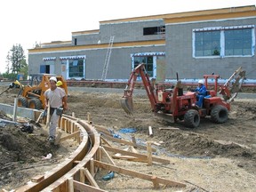George P. Nicholson elementary school in Twin Brooks, shown under construction in 2002, hosts a public health clinic as part of a sharing agreement.